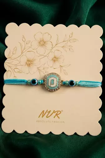 blue evil eye & artificial stones oval shape thread rakhi with roli chawal chandan