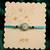 blue evil eye & artificial stones oval shape thread rakhi with roli chawal chandan