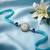 blue evil eye & artificial stones oval shape thread rakhi with roli chawal chandan