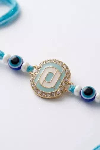 blue evil eye & artificial stones oval shape thread rakhi with roli chawal chandan