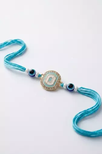 blue evil eye & artificial stones oval shape thread rakhi with roli chawal chandan