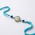 blue evil eye & artificial stones oval shape thread rakhi with roli chawal chandan