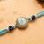 blue evil eye & artificial stones oval shape thread rakhi with roli chawal chandan