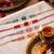 set of 4 multicolor artificial beads thread rakhi with roli chawal chandan mishri