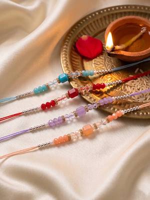 set of 4 multicolor artificial beads thread rakhi with roli chawal chandan mishri 2