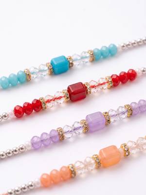 set of 4 multicolor artificial beads thread rakhi with roli chawal chandan mishri 3