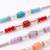 set of 4 multicolor artificial beads thread rakhi with roli chawal chandan mishri