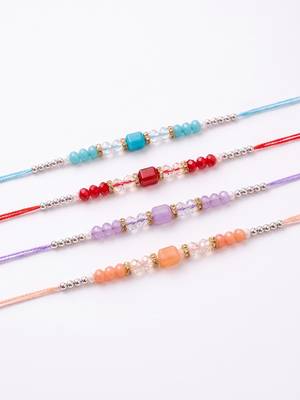set of 4 multicolor artificial beads thread rakhi with roli chawal chandan mishri 4
