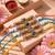 set of 4 multicolor evil eye thread rakhi with roli chawal chandan mishri