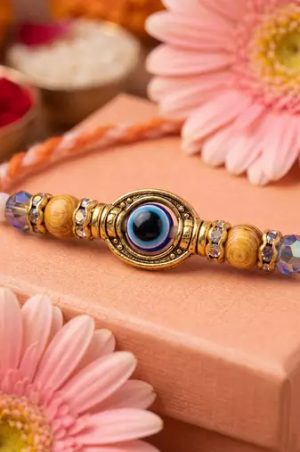 set of 4 multicolor evil eye thread rakhi with roli chawal chandan mishri