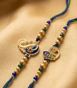 set of 2 krishna & peacock design artificial beads thread rakhi with roli chawal