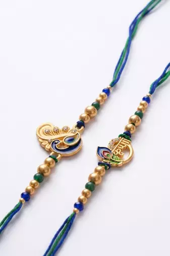set of 2 krishna & peacock design artificial beads thread rakhi with roli chawal