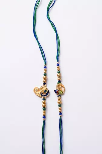 set of 2 krishna & peacock design artificial beads thread rakhi with roli chawal