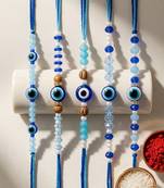 set of 5 blue evil eye thread rakhi with roli chawal chandan mishri