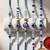set of 5 blue evil eye thread rakhi with roli chawal chandan mishri