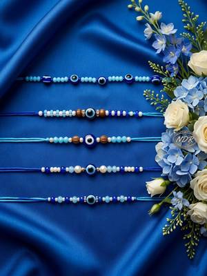 set of 5 blue evil eye thread rakhi with roli chawal chandan mishri 2