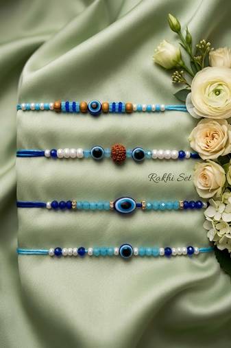set of 4 blue evil eye thread rakhi with roli chawal chandan mishri