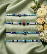 set of 4 blue evil eye thread rakhi with roli chawal chandan mishri