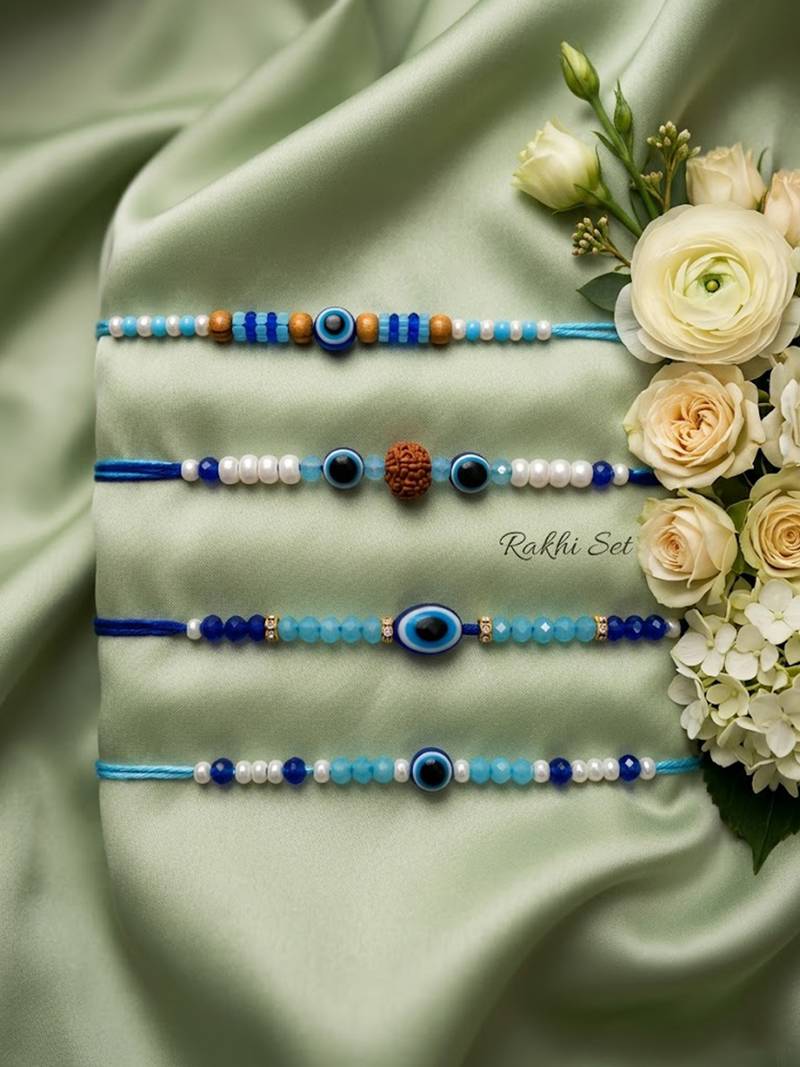 set of 4 blue evil eye thread rakhi with roli chawal chandan mishri
