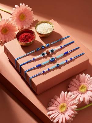 set of 4 blue evil eye thread rakhi with roli chawal chandan mishri 2