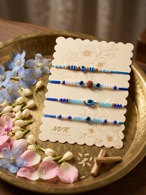 set of 4 blue evil eye thread rakhi with roli chawal chandan mishri 5