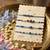 set of 4 blue evil eye thread rakhi with roli chawal chandan mishri