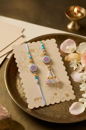 set of 2 floral design bhaiya bhabhi rakhi with roli chawal chandan mishri