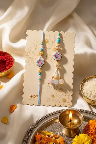 set of 2 floral design bhaiya bhabhi rakhi with roli chawal chandan mishri