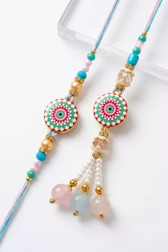 set of 2 floral design bhaiya bhabhi rakhi with roli chawal chandan mishri