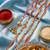 set of 4 artificial beads family pack thread rakhi with roli chawal chandan mishri