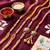 set of 4 artificial beads family pack thread rakhi with roli chawal chandan mishri