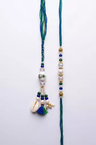 set of 2 traditional bhaiya bhabhi rakhi with roli chawal chandan mishri