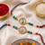 set of 2 multicolor peacock design rakhi with roli chawal chandan mishri