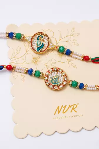 set of 2 multicolor peacock design rakhi with roli chawal chandan mishri