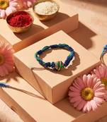 magnetic opening blue meenakari work thread rakhi with roli chawal chandan mishri