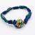 magnetic opening blue meenakari work thread rakhi with roli chawal chandan mishri