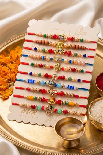 set of 10 artificial stones & beads thread rakhi with roli chawal chandan mishri
