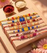 set of 7 multicolor designer thread rakhi with roli chawal chandan mishri