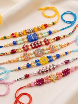 set of 7 multicolor designer thread rakhi with roli chawal chandan mishri 3