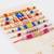 set of 7 multicolor designer thread rakhi with roli chawal chandan mishri