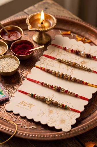 set of 5 multicolor designer thread rakhi with roli chawal chandan mishri