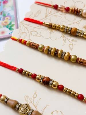 set of 5 multicolor designer thread rakhi with roli chawal chandan mishri 3