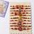 set of 10 multicolor designer thread rakhi with roli chawal chandan mishri