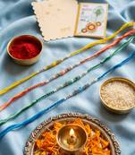set of 4 multicolor artificial beads thread rakhi with roli chawal chandan mishri
