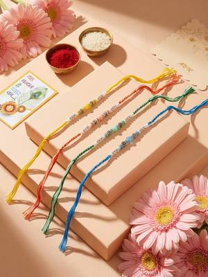 set of 4 multicolor artificial beads thread rakhi with roli chawal chandan mishri 3