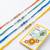set of 4 multicolor artificial beads thread rakhi with roli chawal chandan mishri