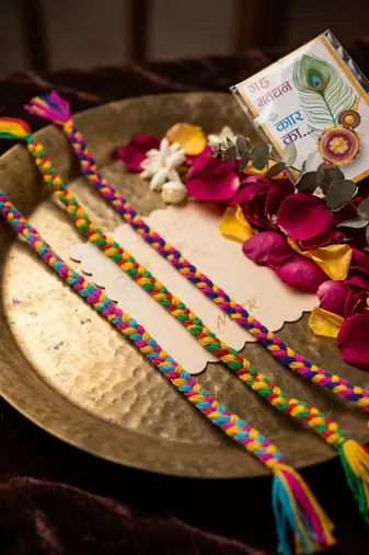 set of 3 multicolor thread rakhi with roli chawal chandan mishri