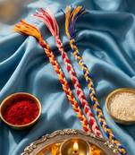 set of 3 multicolor thread rakhi with roli chawal chandan mishri