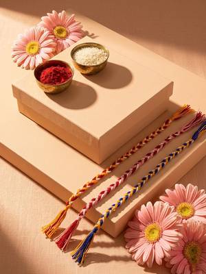set of 3 multicolor thread rakhi with roli chawal chandan mishri 3