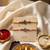 set of 2 multicolor religious thread rakhi with roli chawal chandan mishri
